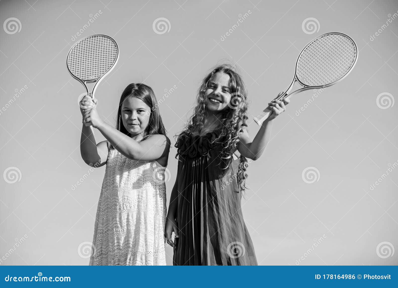 Active Life. Children Play Tennis Blue Sky Background. Sporty Kids. Small  Girls With Pink Tennis Racket. Summer Leisure Stock Photo - Image of blue,  happy: 178164986