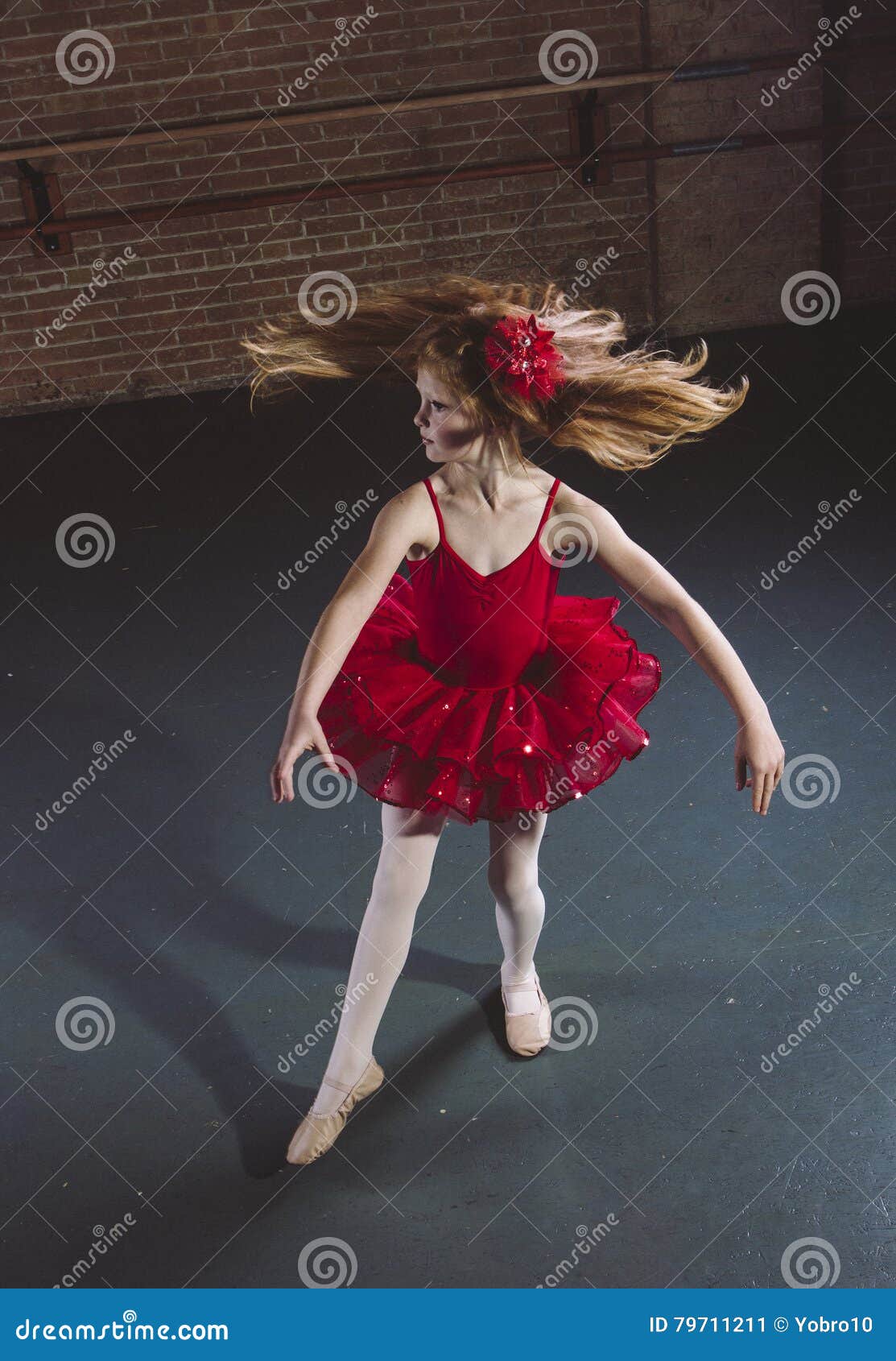 Active Little Dancer Spinning And Dancing At A Dance Studio Royalty