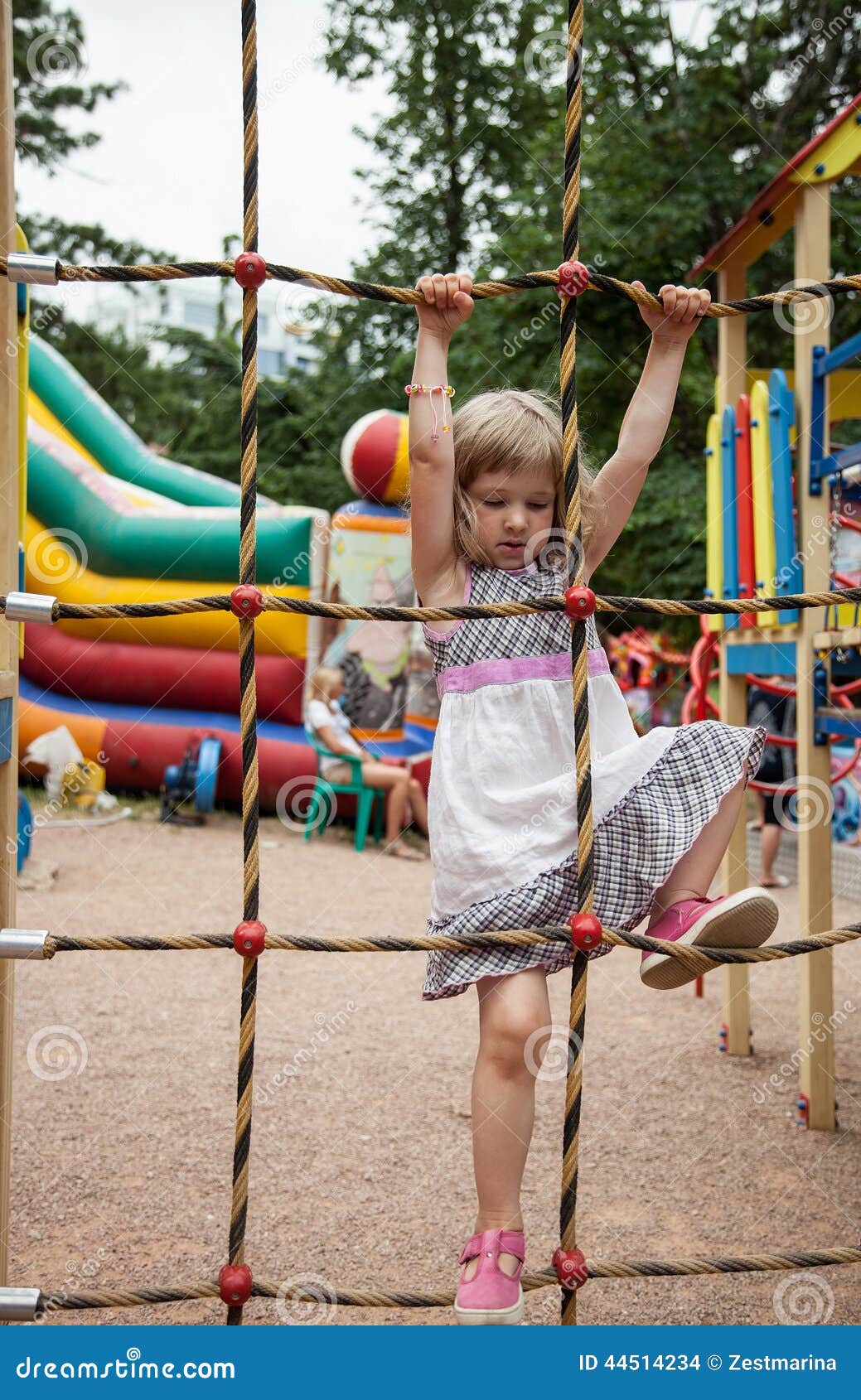 Active Little Girl Climbing on a Ladder Stock Photo Image of move