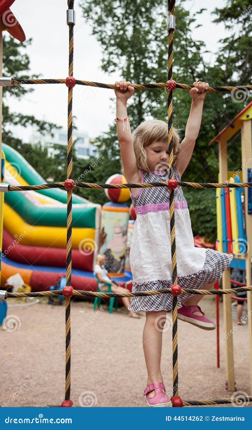 Active Little Girl Climbing on a Ladder Stock Photo Image of little