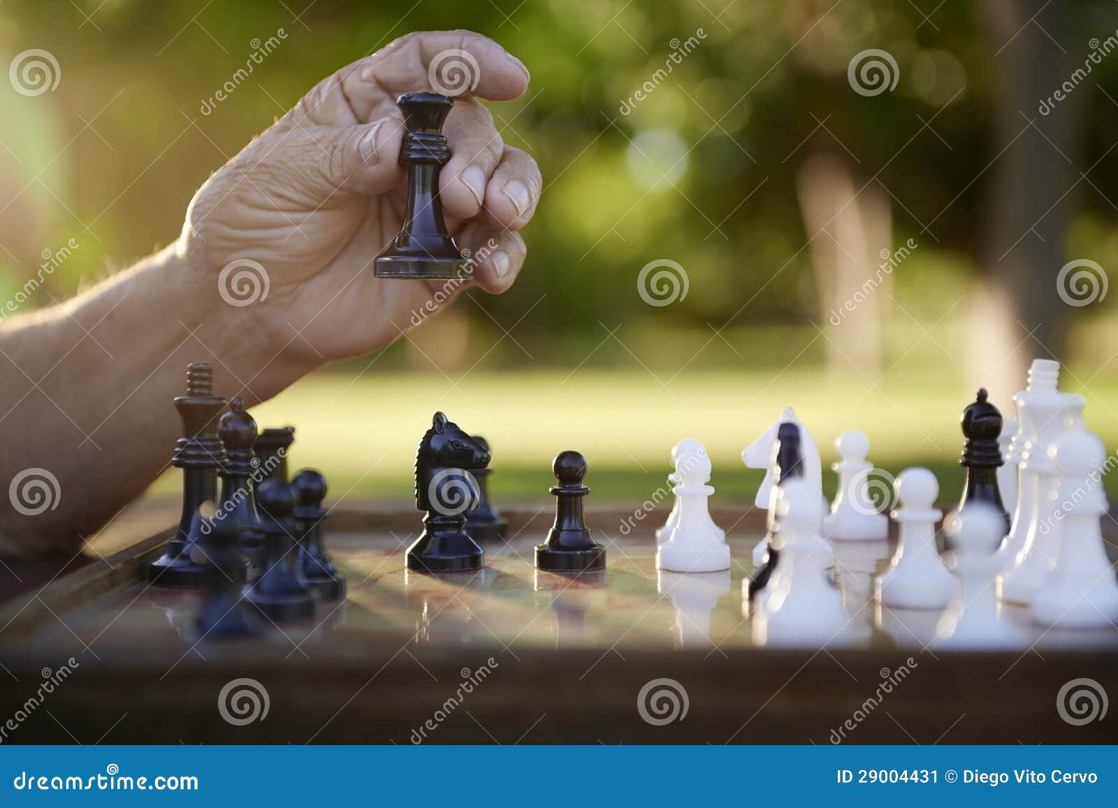 Senior Man Contemplating On His Next Move In Chess Game Stock Photo,  Picture and Royalty Free Image. Image 39013564.