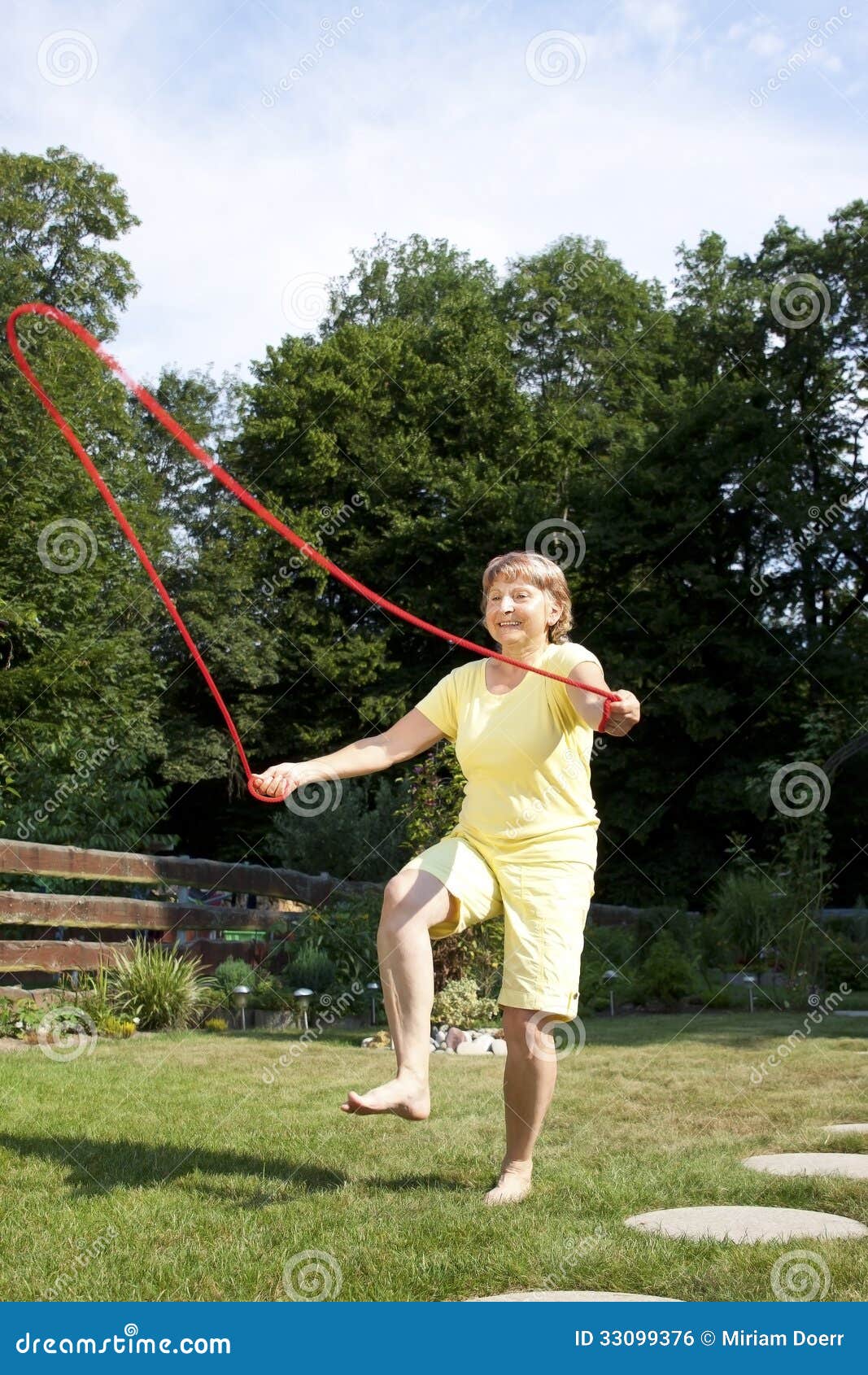 Active Senior Woman is Jumping Rope Stock Photo Image of happy