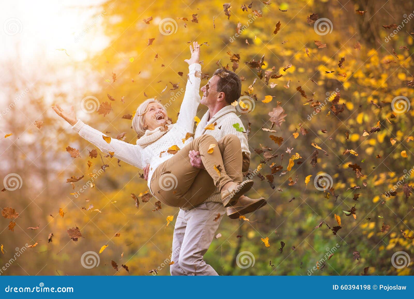 active seniors having fun in nature