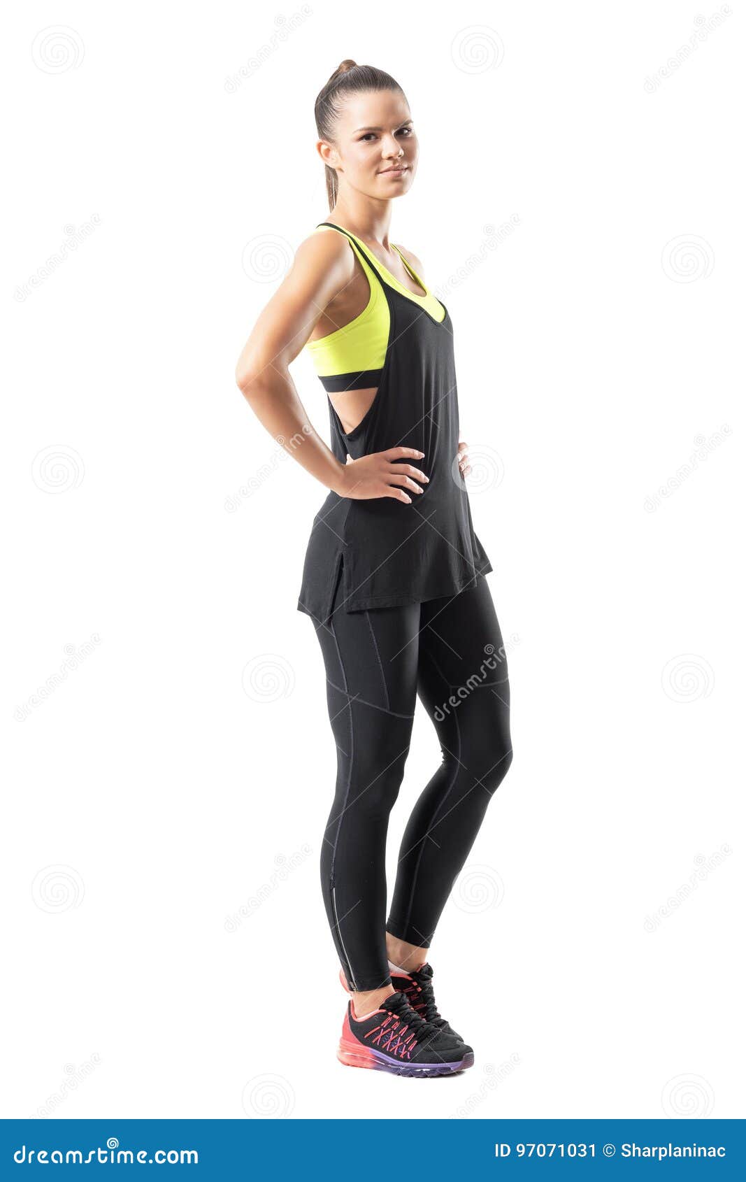 Active Young Sportswoman in Black Tank Top and Leggings Side View ...