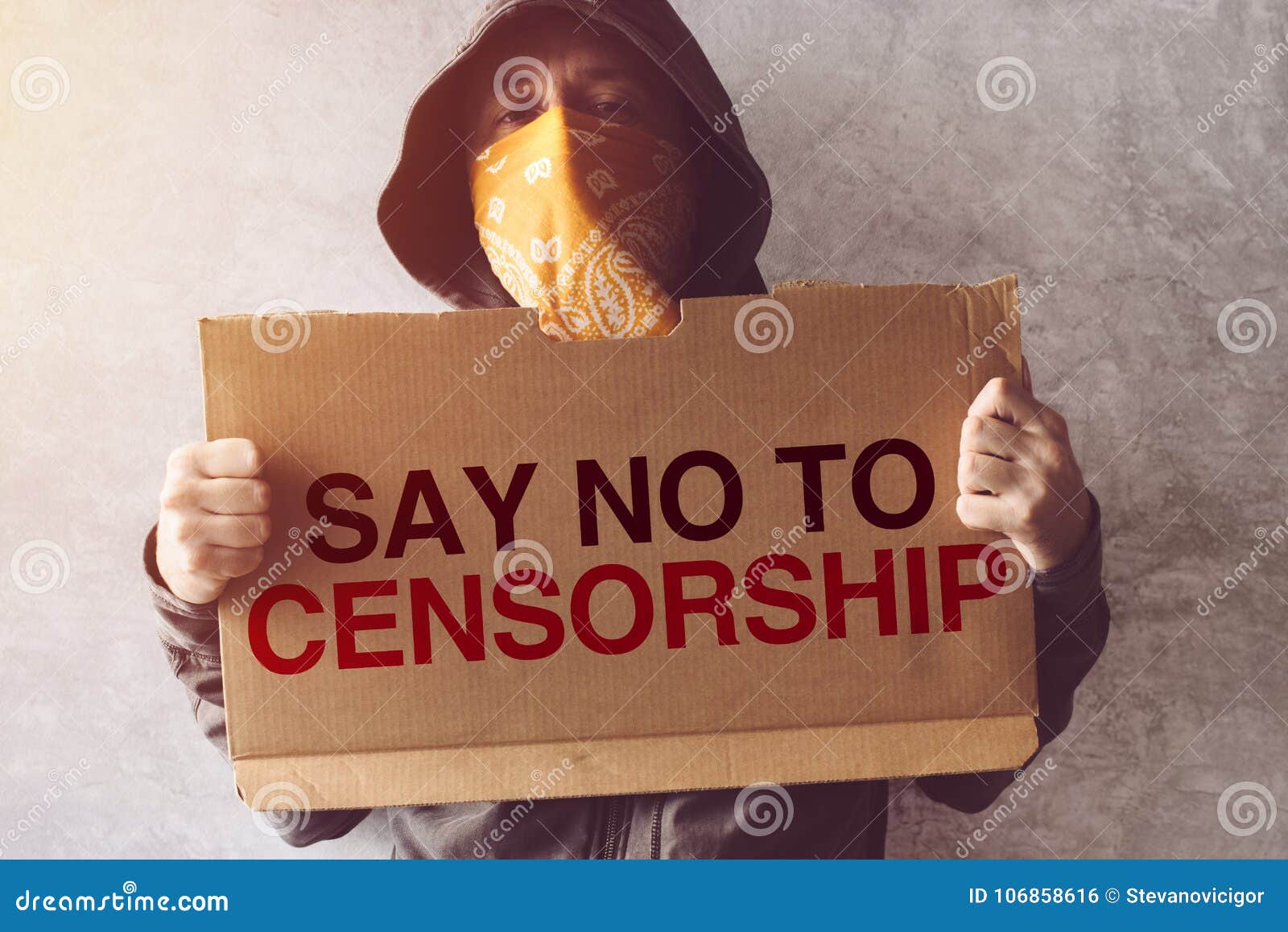 activist holding say no to censorship protest sign