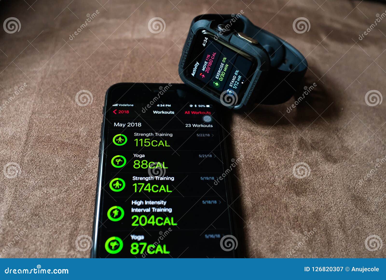 Activity App on iPhone editorial photography. Image of watch 126820307