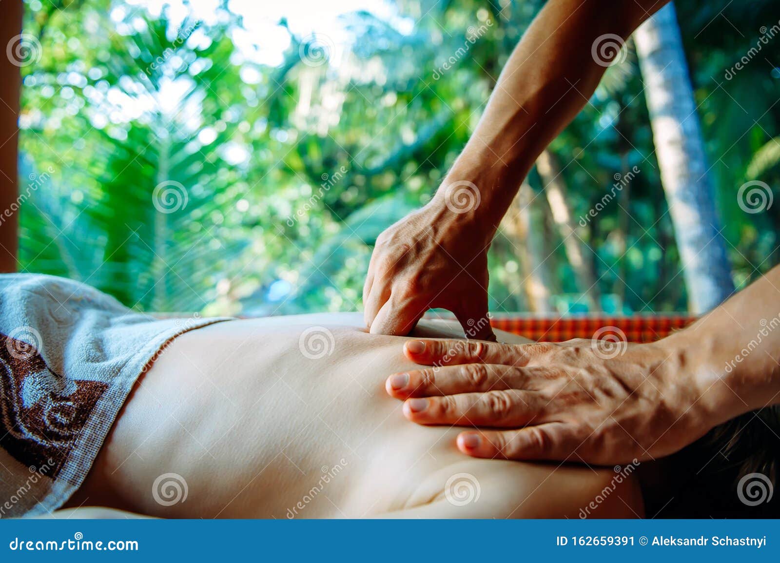 Acupressure Massage In Spa Centre Outdoor Woman At Acupressure Back