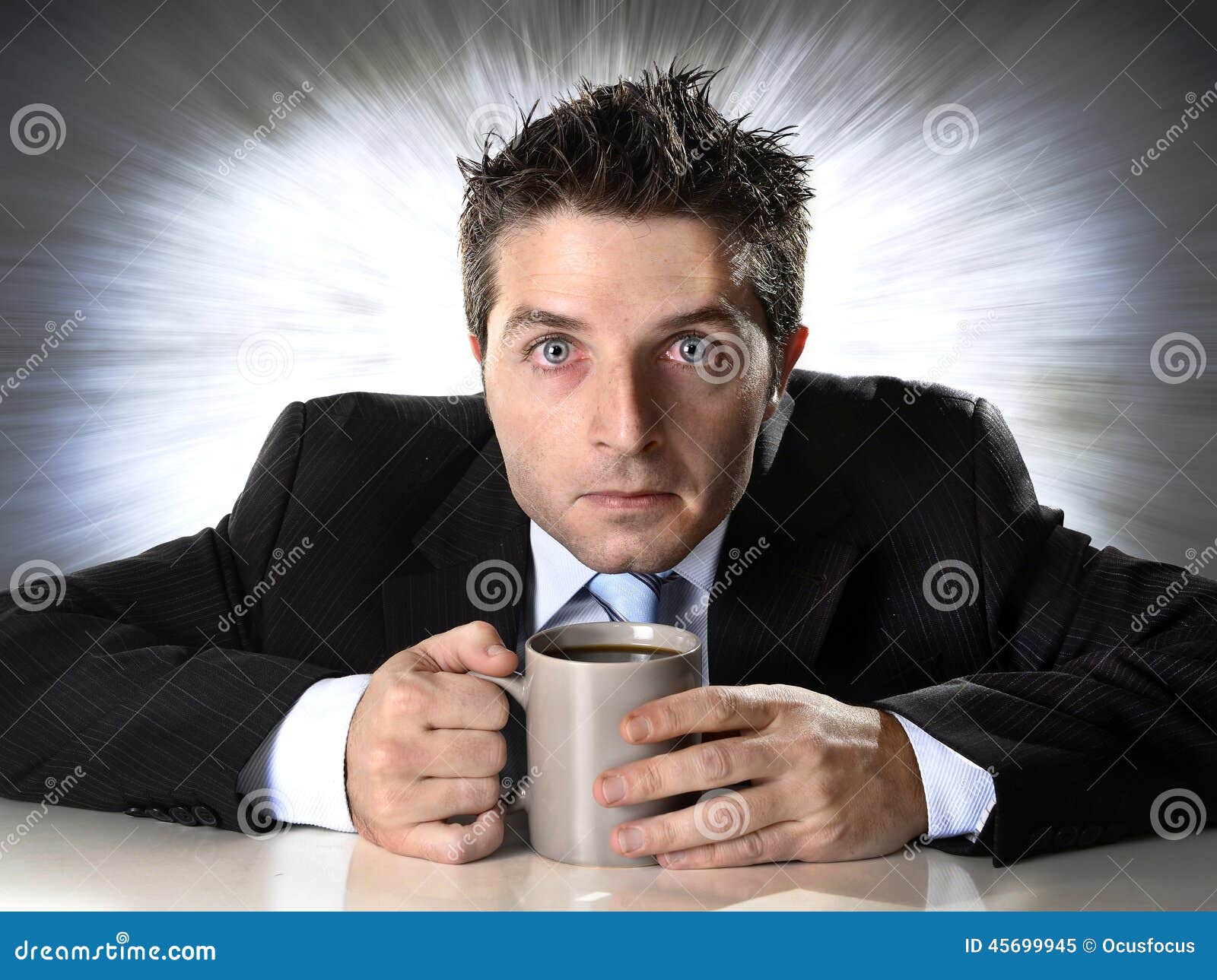 addict businessman holding cup of coffee anxious and crazy in caffeine addiction
