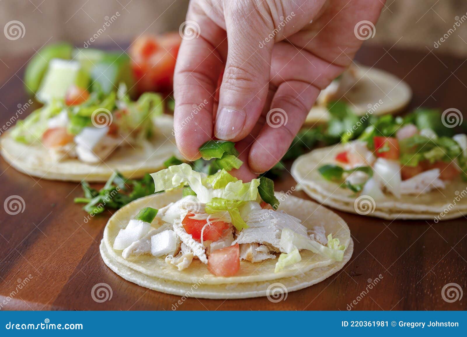 Adding Chopped Peppers on a Street Taco Stock Image Image of greens