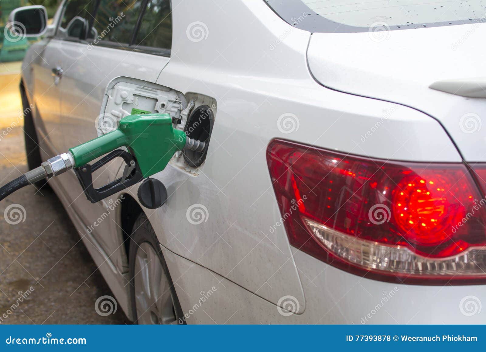 Adding fuel stock photo. Image of tank, fuel, filling 77393878
