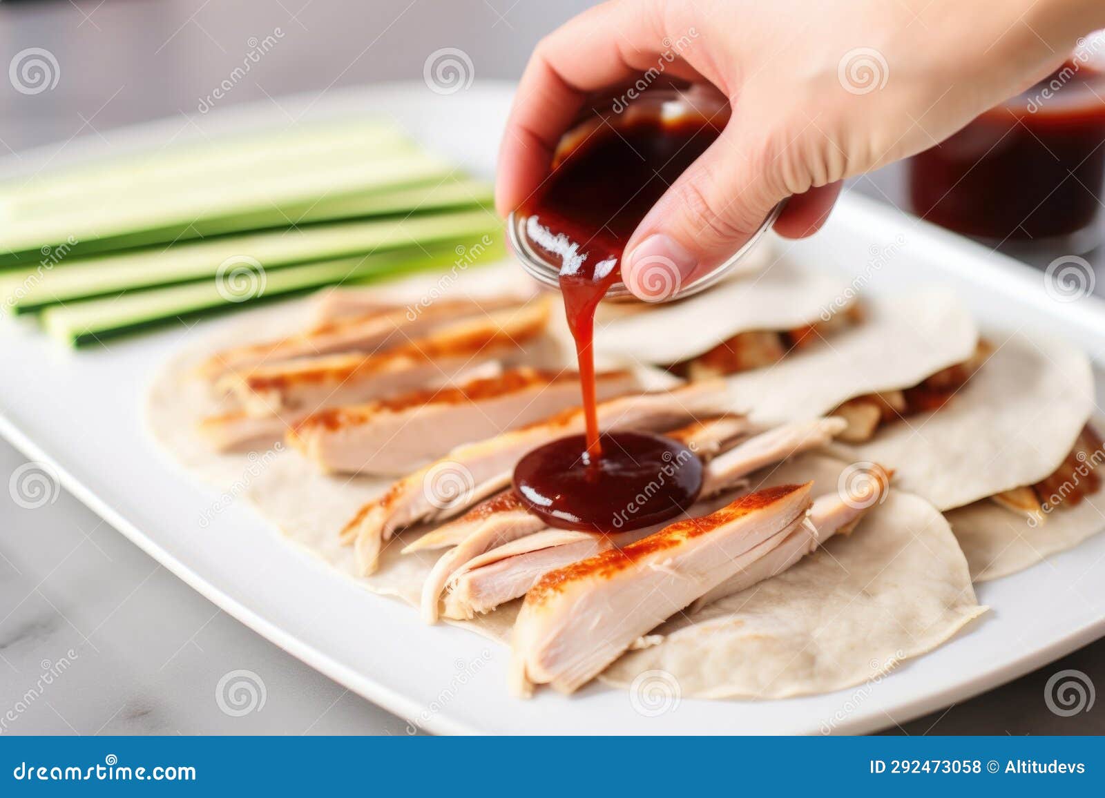 Adding Hoisin Sauce on Peking Duck Slices Stock Photo - Image of peking