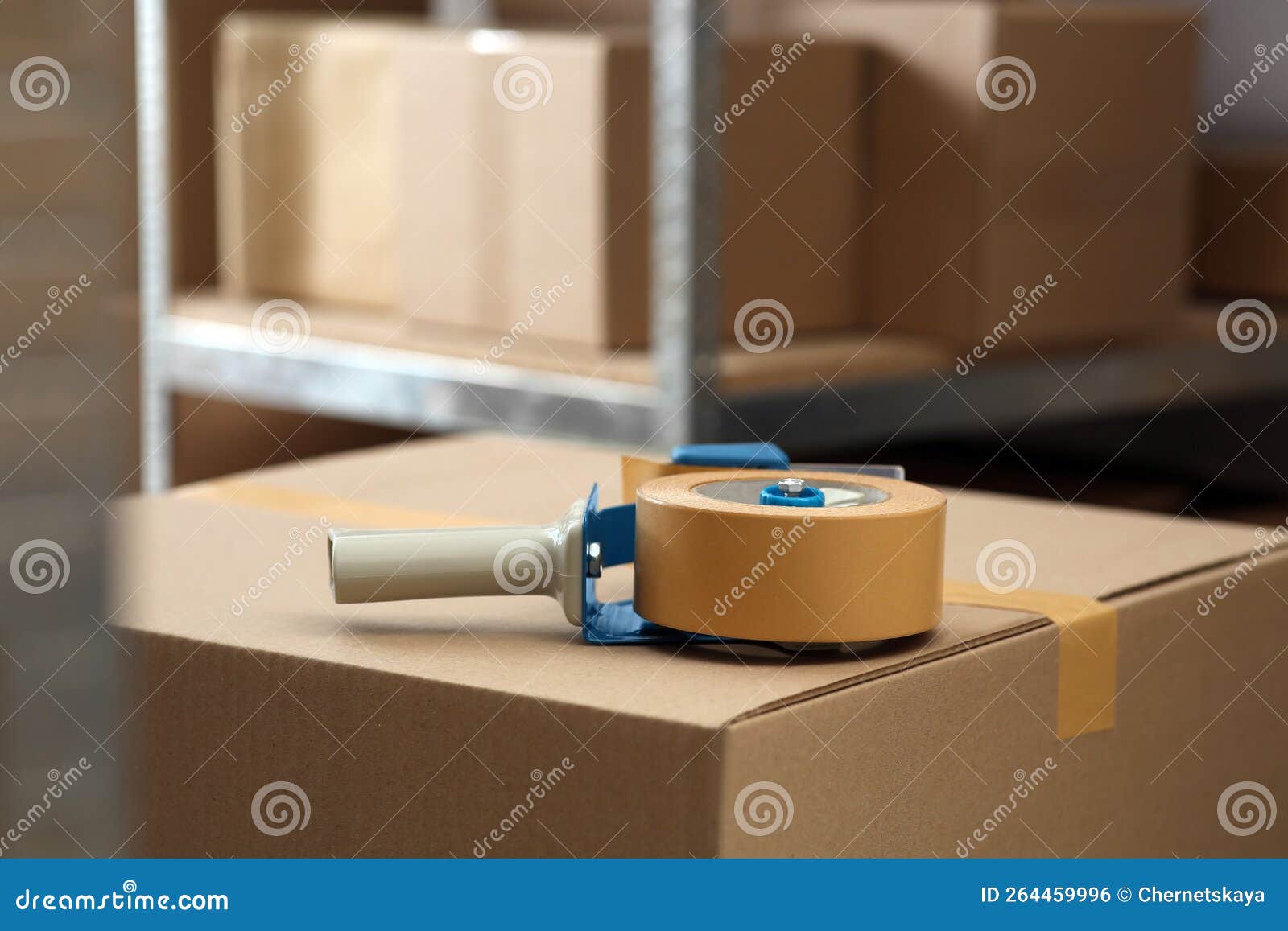 Adhesive Tape Dispenser on Cardboard Box Indoors Stock Photo Image of