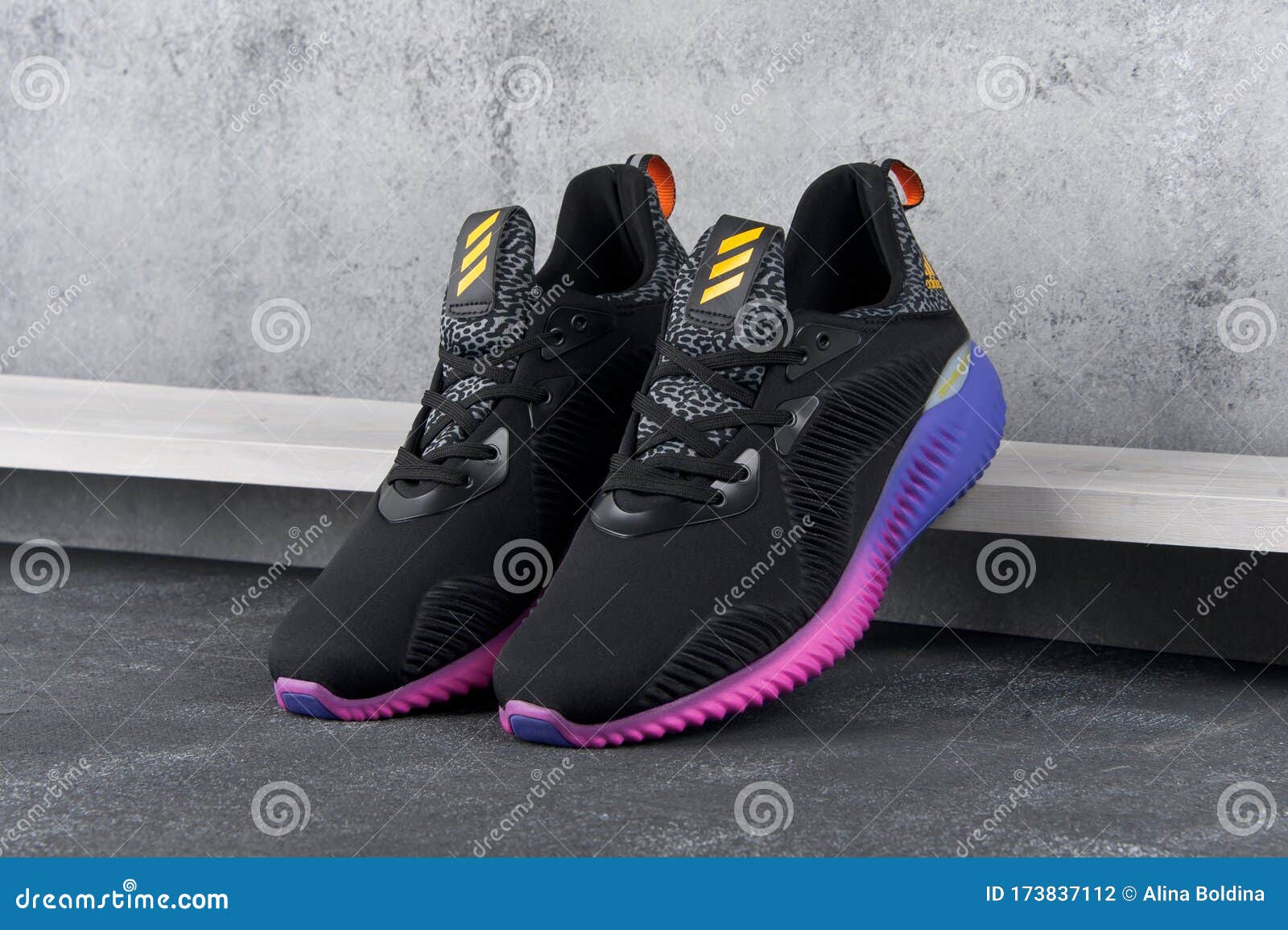 Adidas AlphaBounce Shoes, on Grey Abstract Background. Krasnoyarsk, Russia - May 12, 2017 Editorial Photography - of adidas, lowcut: 173837112