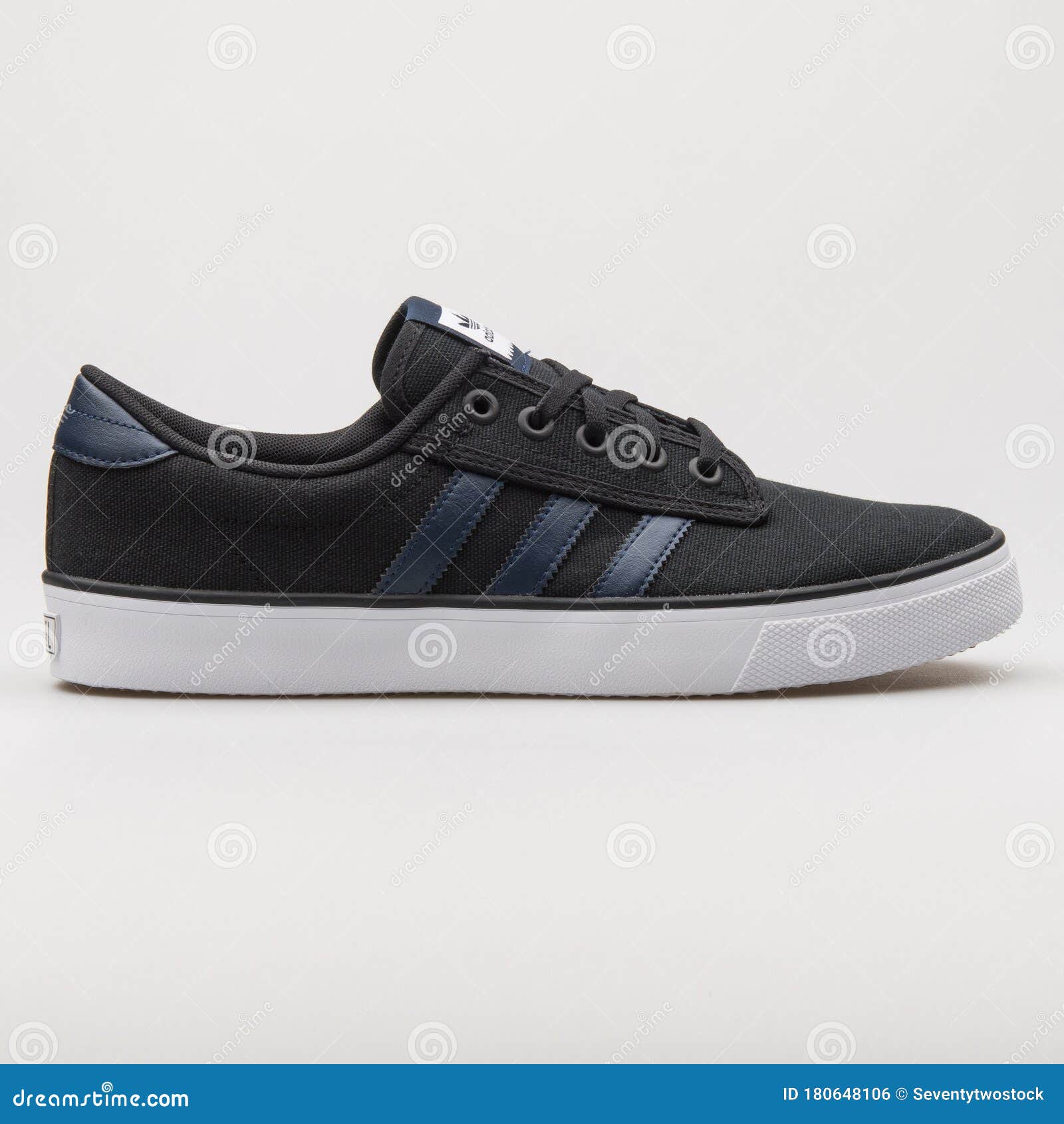 Adidas Kiel Black, Navy Blue and White Sneaker Editorial Photo - Image of background: 180648106