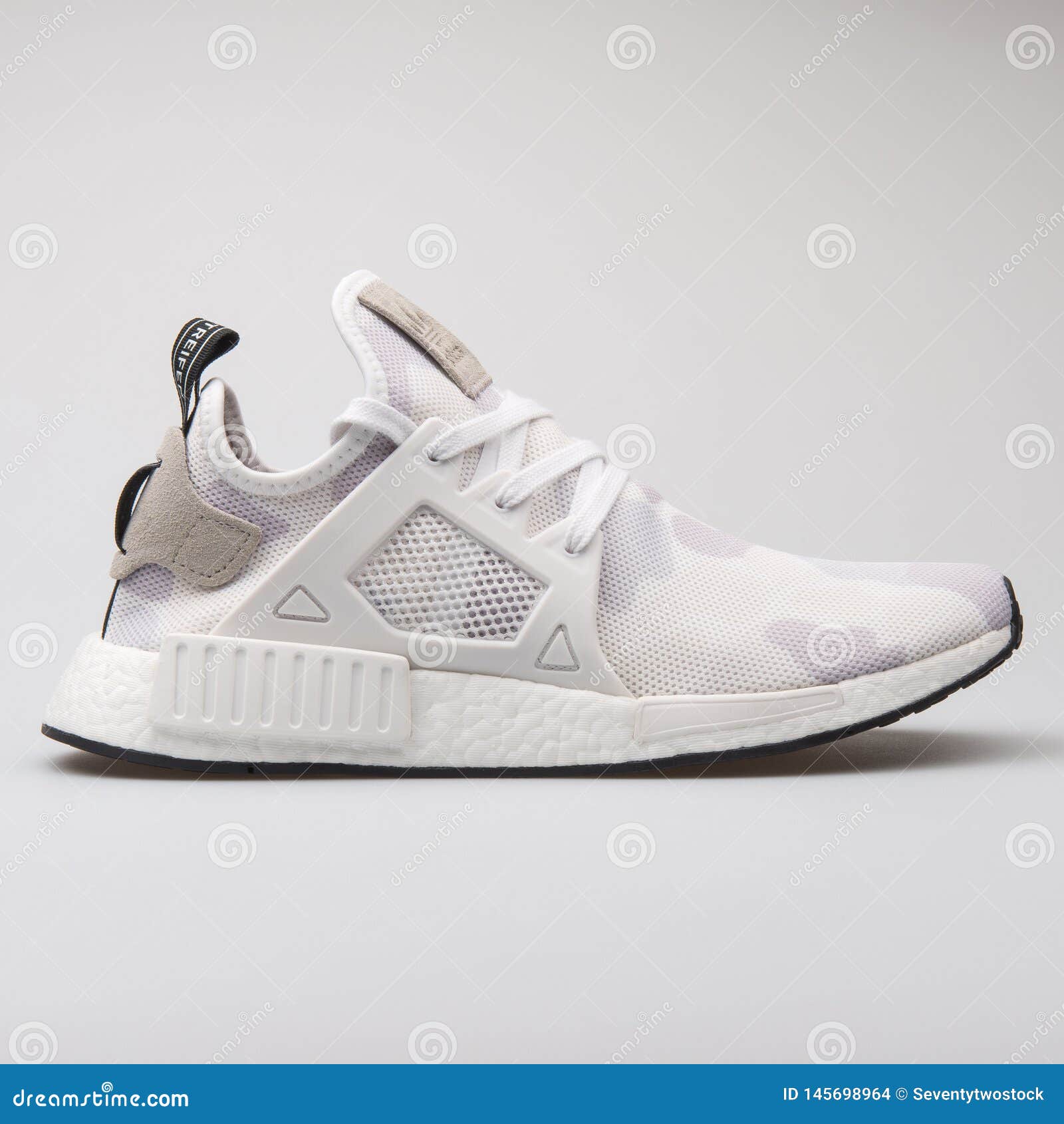 NMD XR1 Duck Camo Sneaker Editorial Image - of athletic, background: 145698964