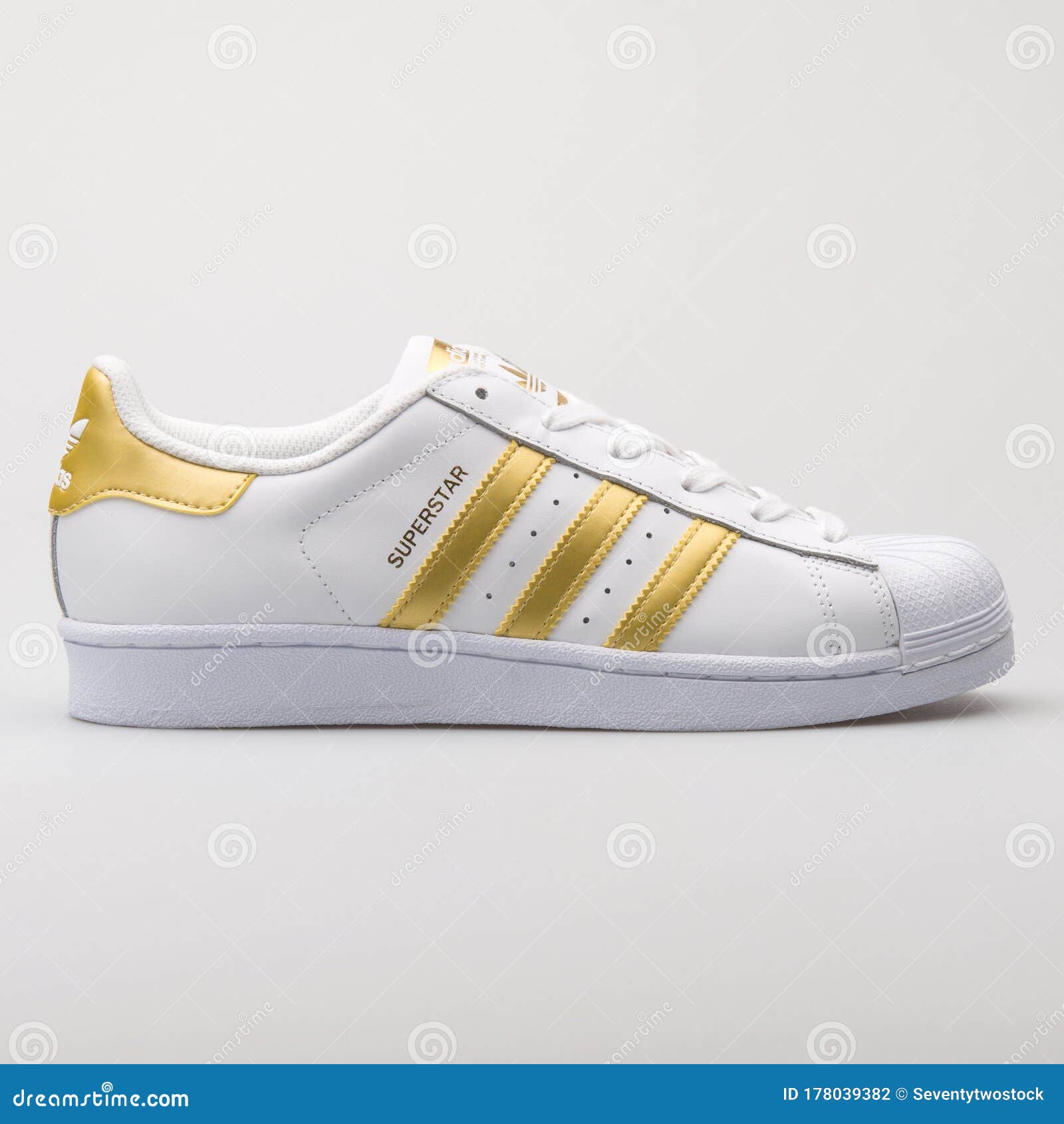 Adidas Superstar White and Yellow Sneaker Editorial Photography - Image ...