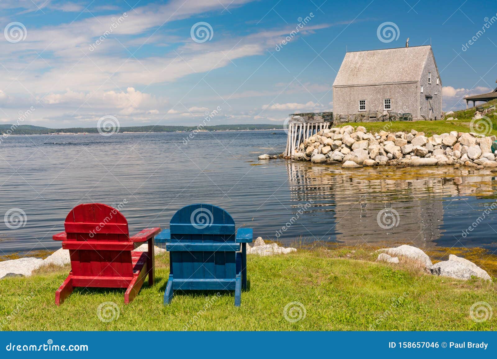 Adirondack Chairs Along The Coast In Nova Scotia Stock 