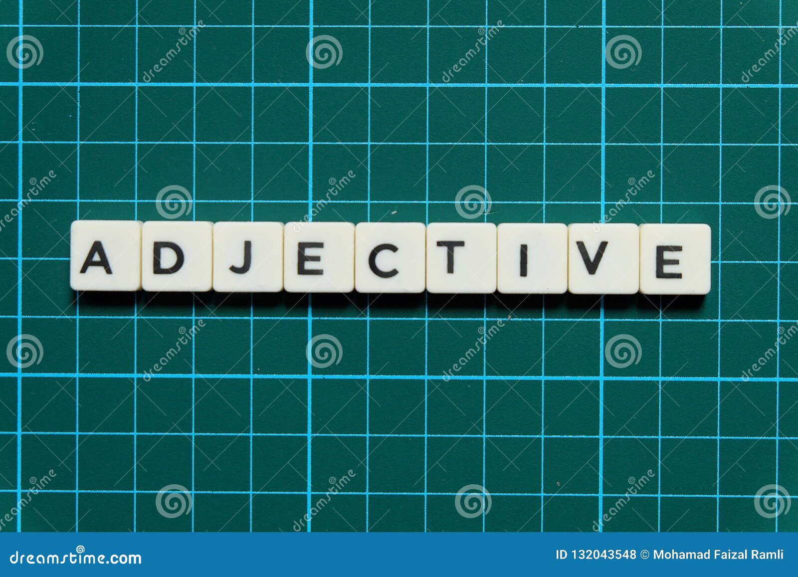 Adjective Word Written On Wood Block. Adjective Text On Cement Table