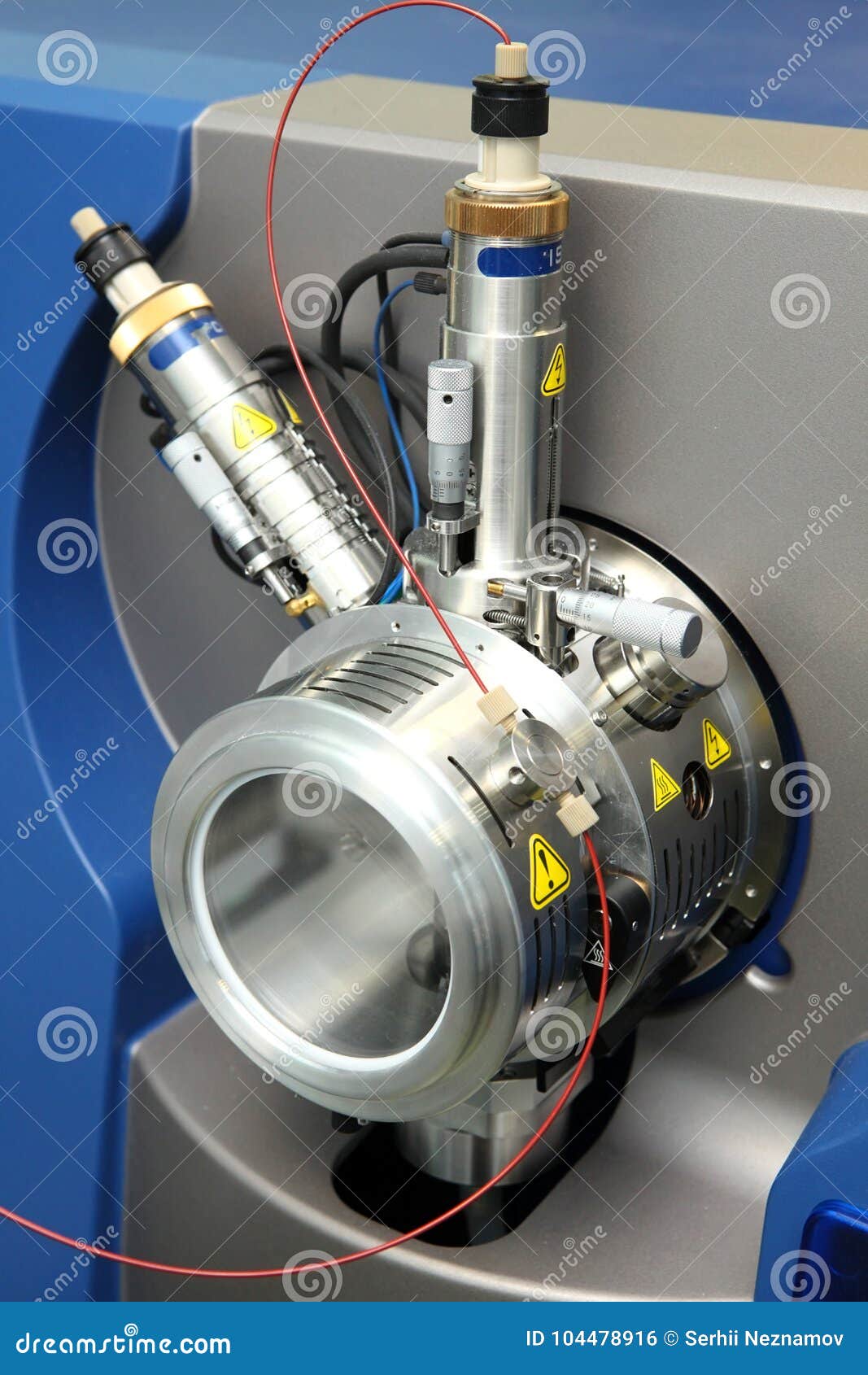 adjust the mass spectrometer. the man analyzes the device for de