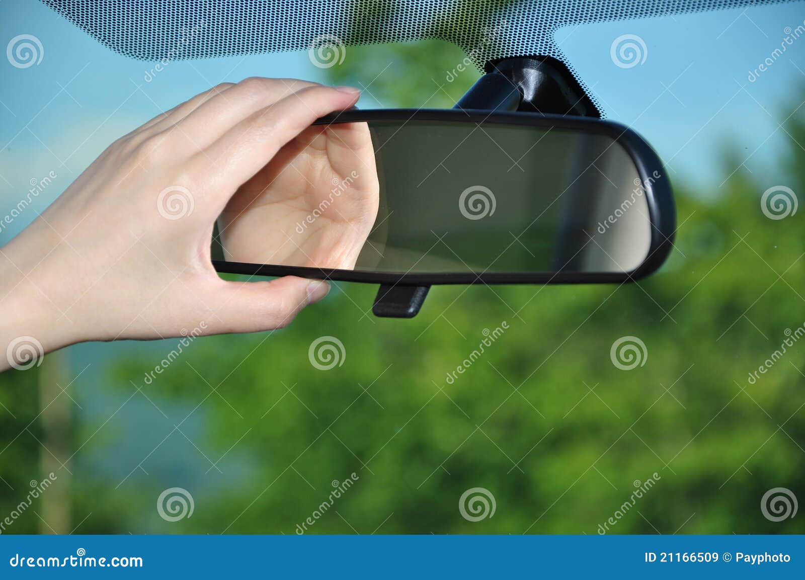 adjusting rear view mirror