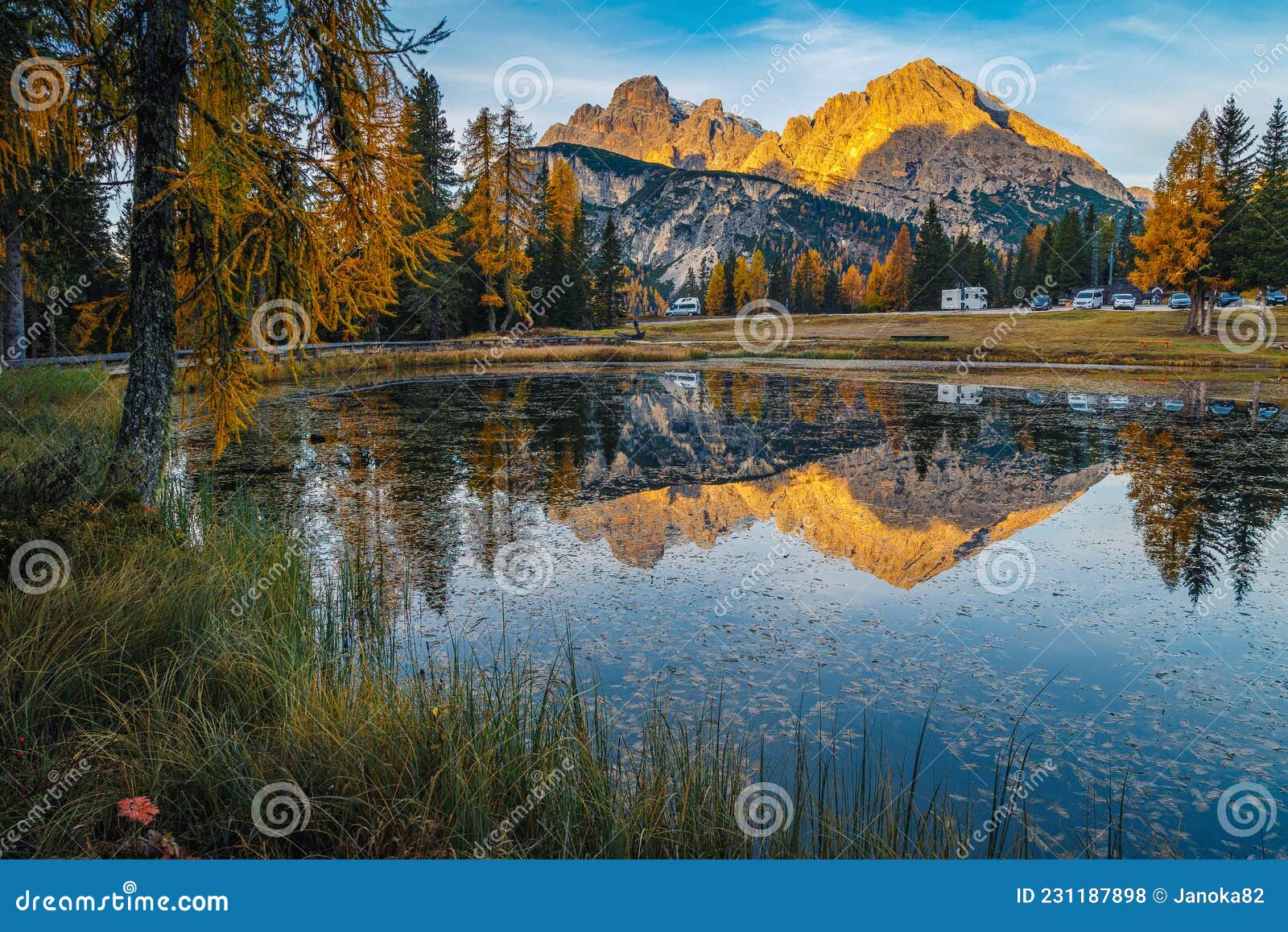 admirable autumn sunrise landscape with antorno lake in dolomites, italy