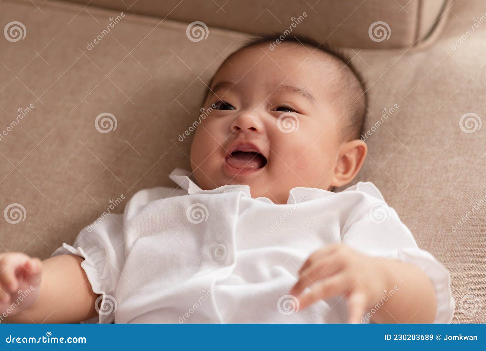 Adorable Asian Baby Girl Lying on Bed Looking at Camera.Cute ...