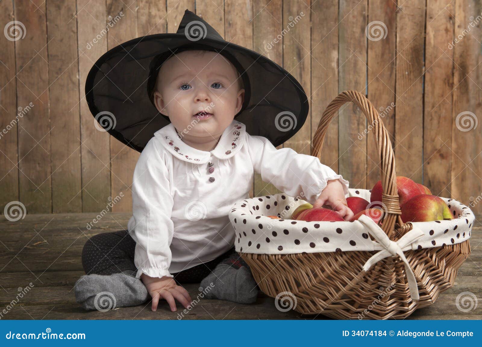 Adorable Baby with Halloween Hat and Apples Stock Photo - Image of ...