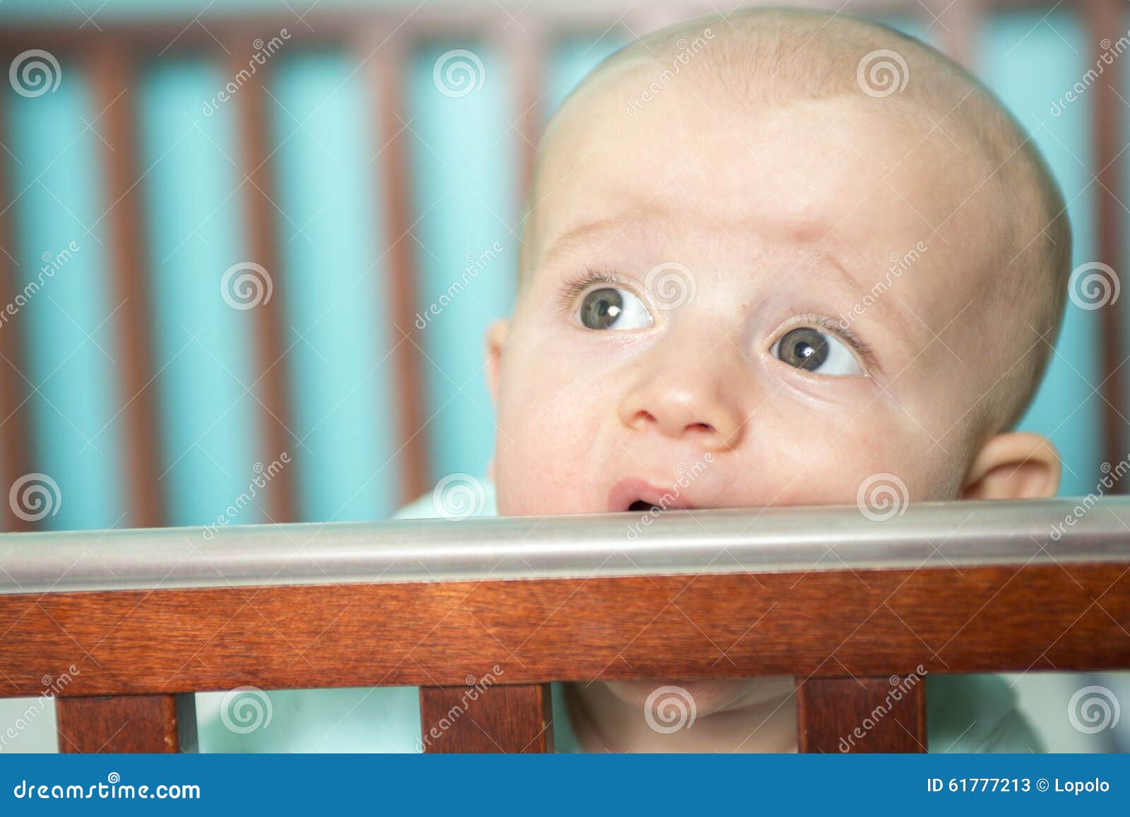 Adorable baby in his crib stock image. Image of eyes 61777213