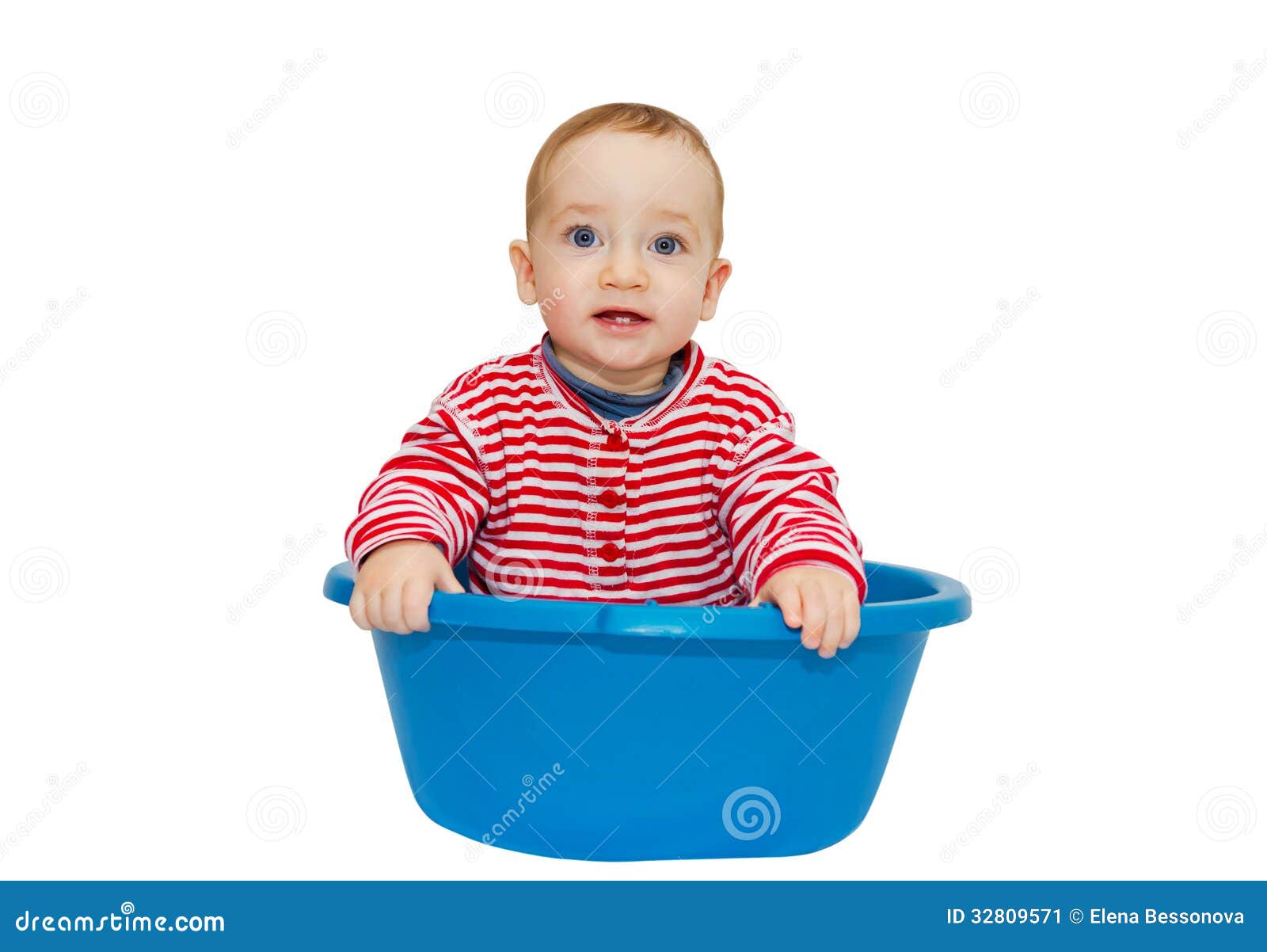 adorable baby sit in a blue basin