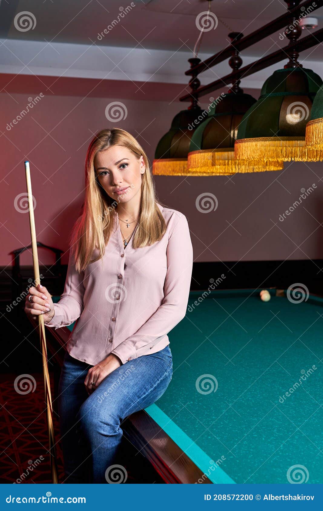 Adorable Blond Female Came To Spend Pleasant Time Playing Snooker Stock Photo