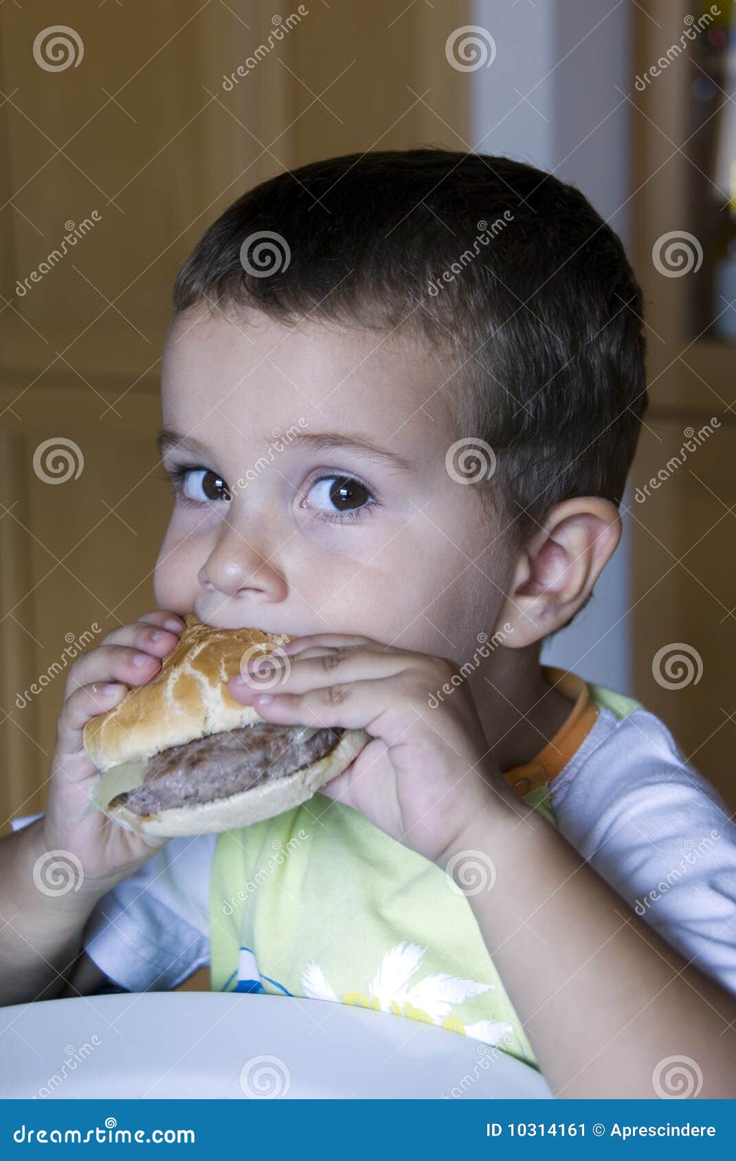Adorable Boy Eating Cheeseburger Stock Image Image of breakfast