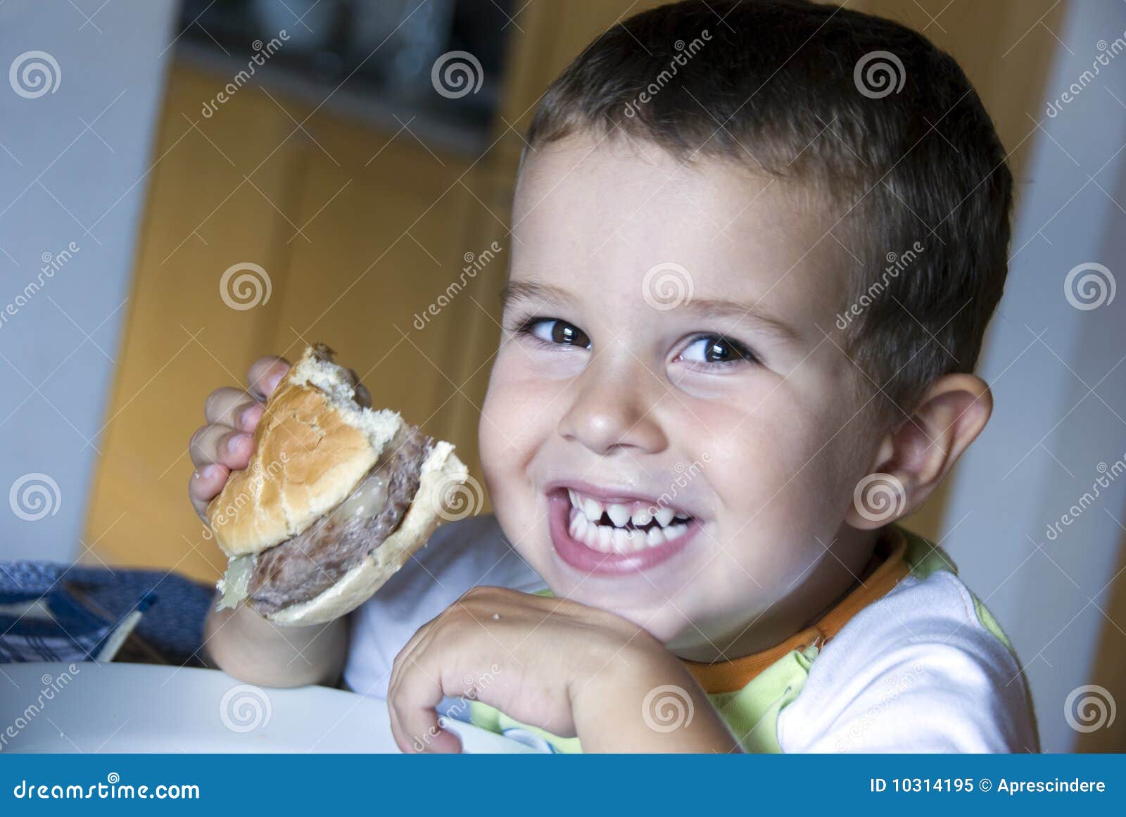 Adorable Boy Eating Cheeseburger Stock Image Image of childhood