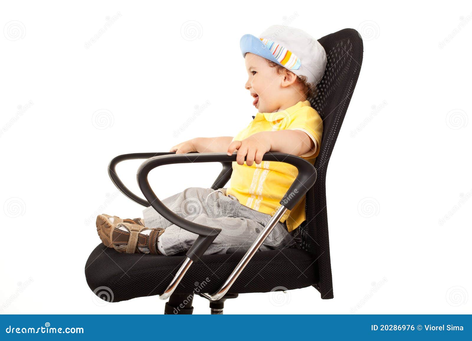 Adorable Boy Sitting On A Chair Stock Photo - Image of male, pretty