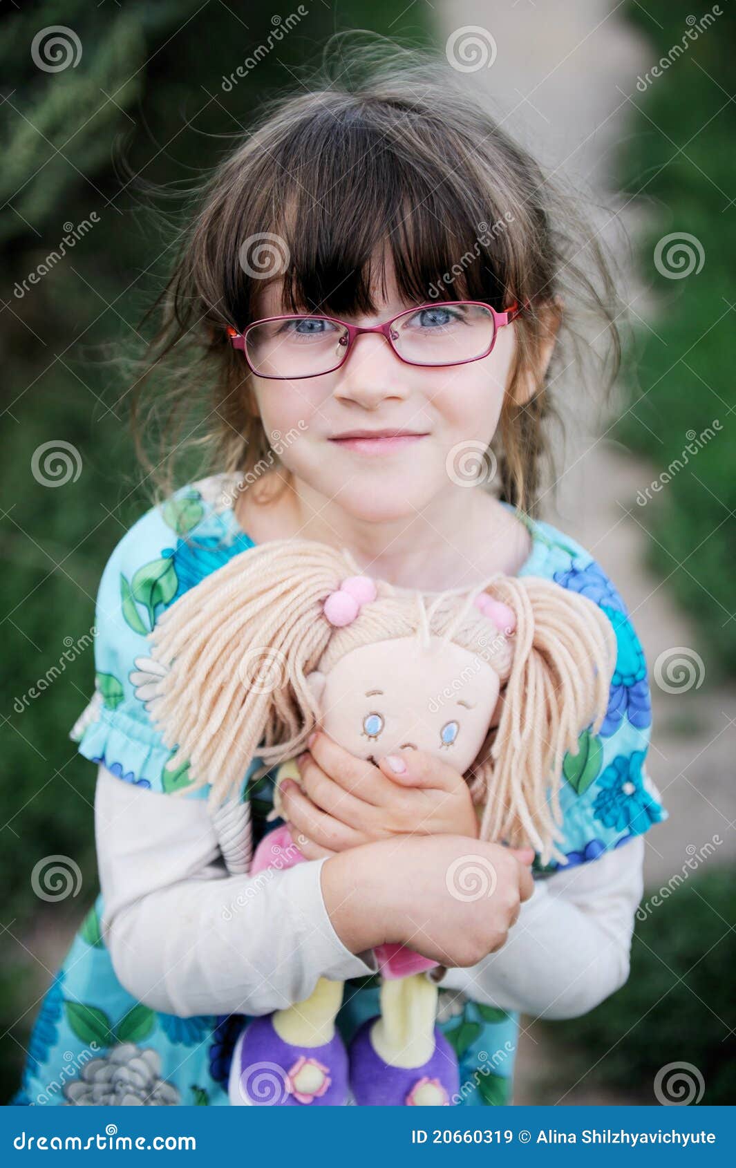 baby doll with glasses