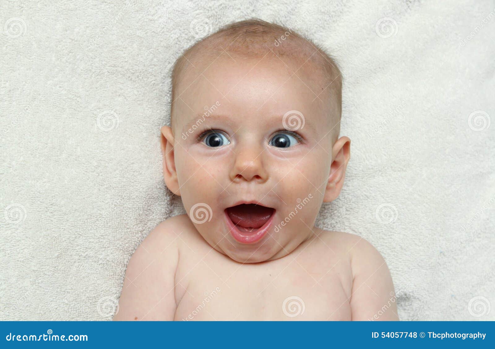 adorable excited smiling baby open mouth laughing