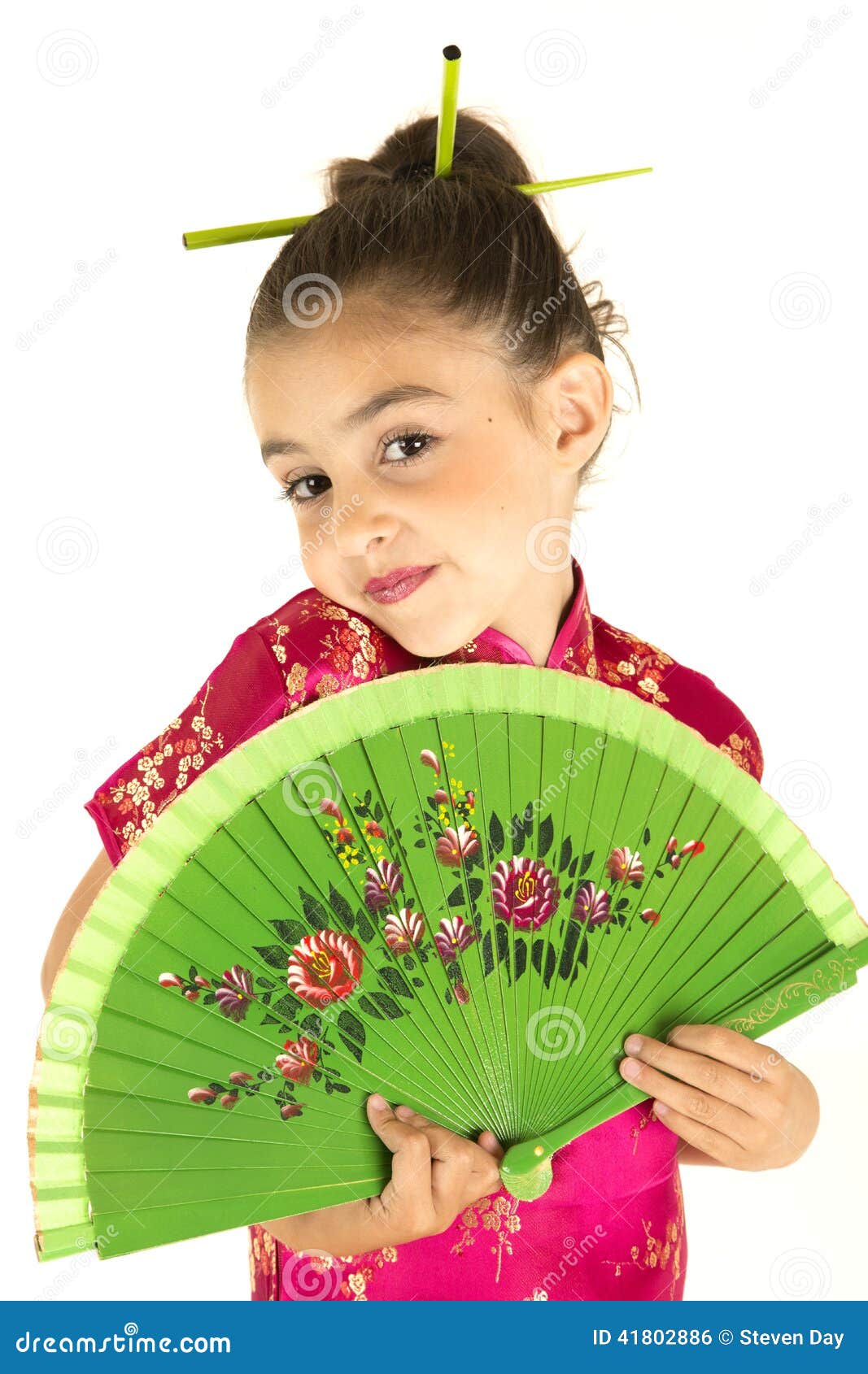 Adorable Girl in Asian Dress Showing a Coy Expression Stock Photo ...