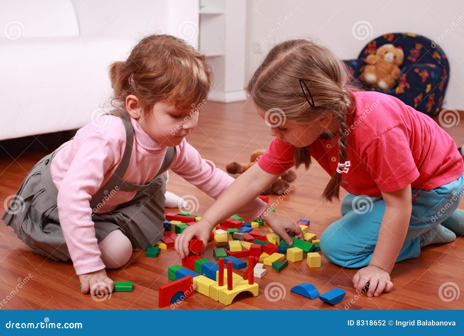 adorable kids playing with blocks