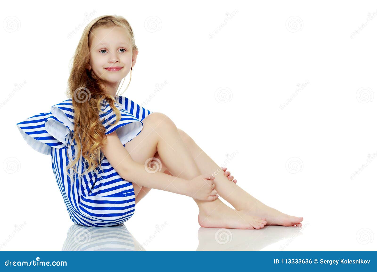 Adorable Little Blond Girl in Very Short Summer Striped Dress. Stock ...