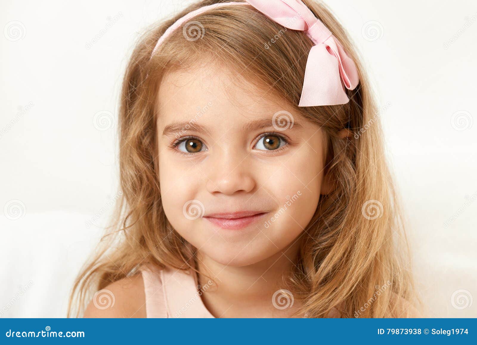 adorable little child girl face closeup portrait