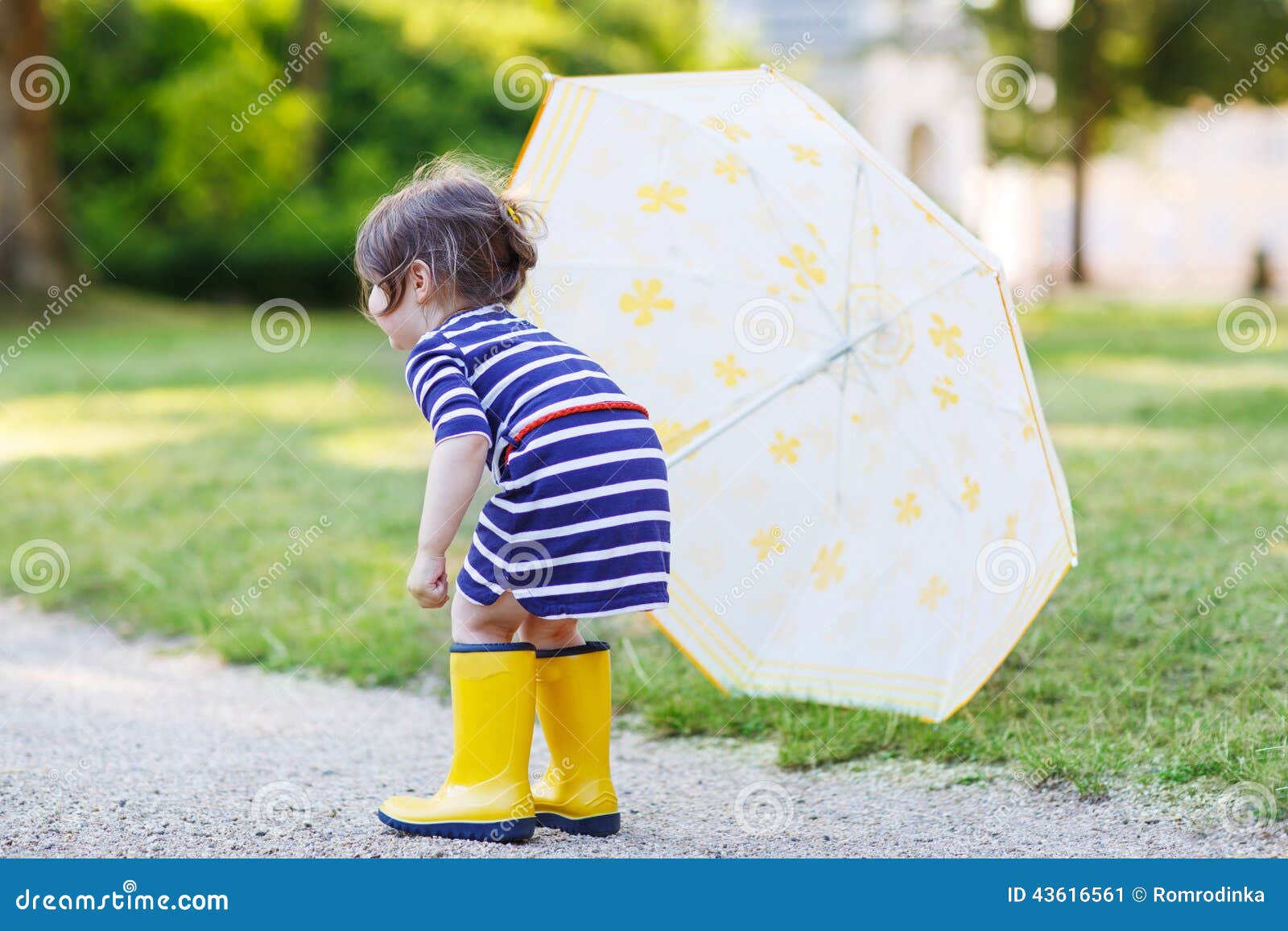 Adorable Little Child In Yellow Rain Boots And Umbrella In Summe Stock ...