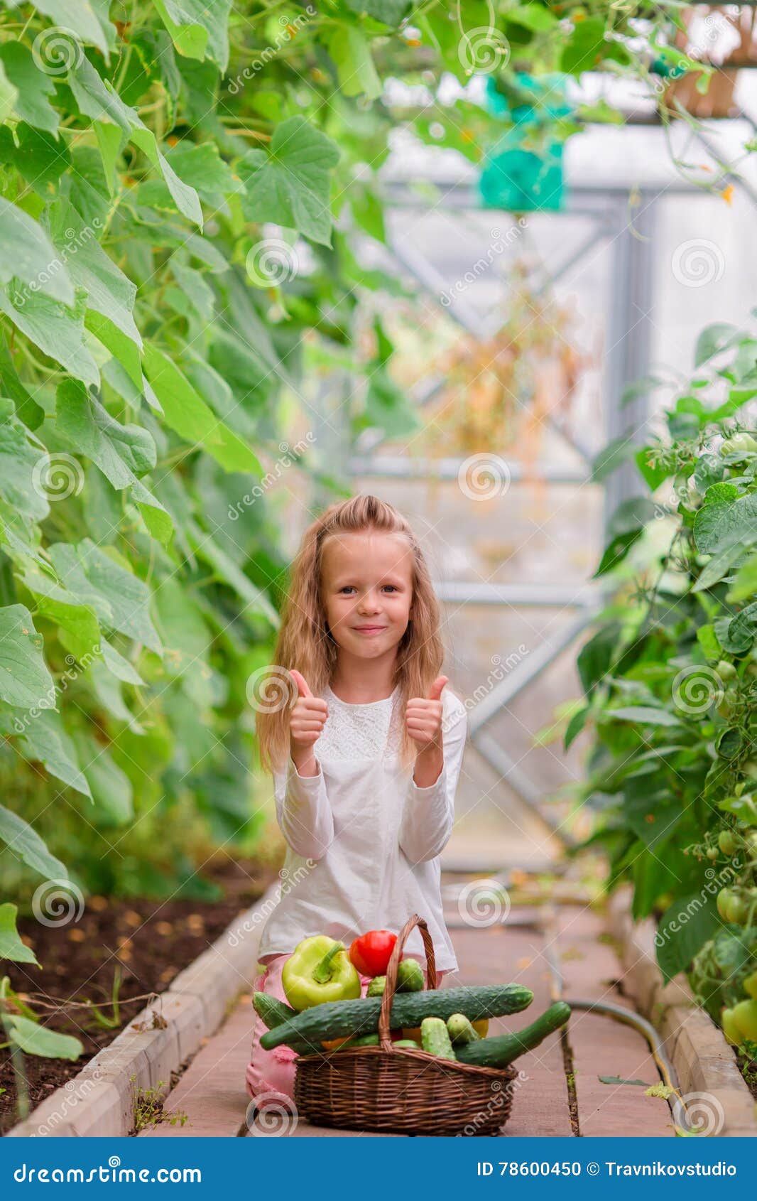 Adorable Little Girl with a Basket in Autumn Day Outdoors Stock Photo ...
