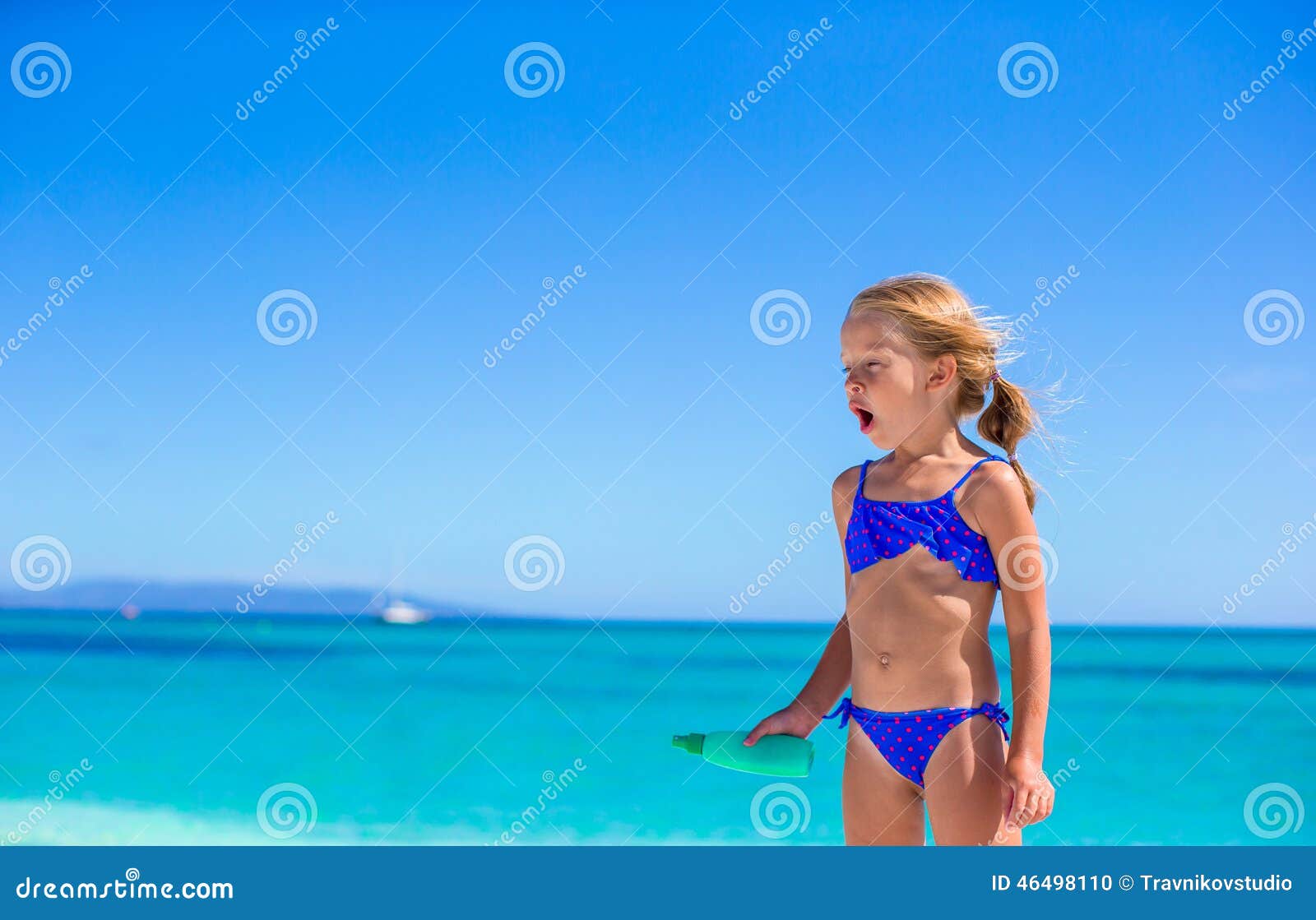 adorable little girl have fun at tropical beach