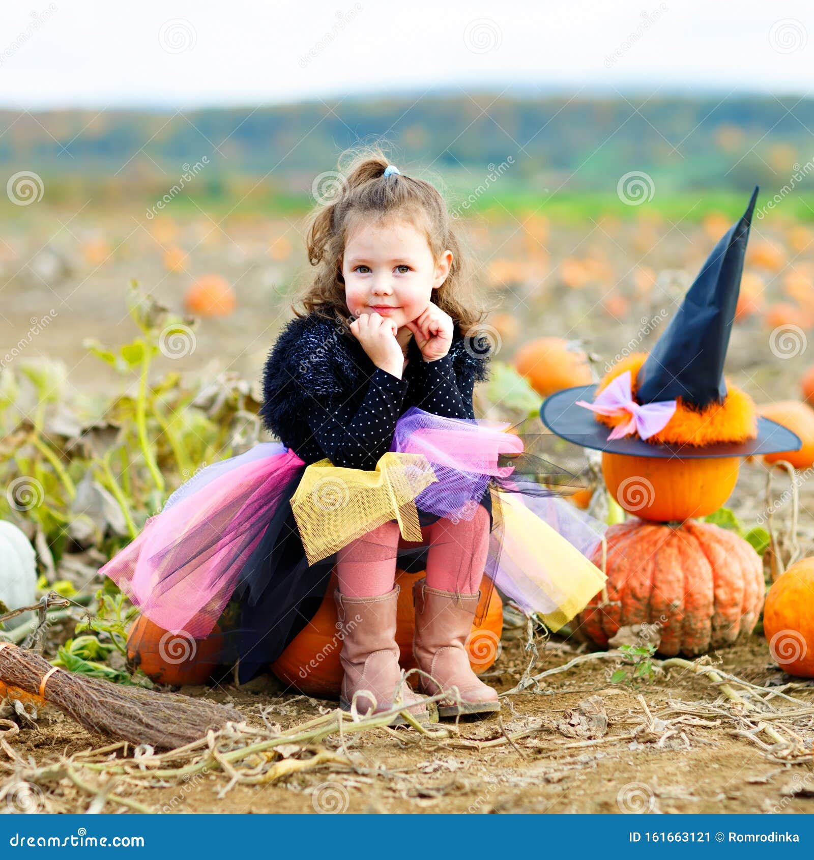 Adorable Little Girl Wearing Halloween Witch Costume Having Fun on ...