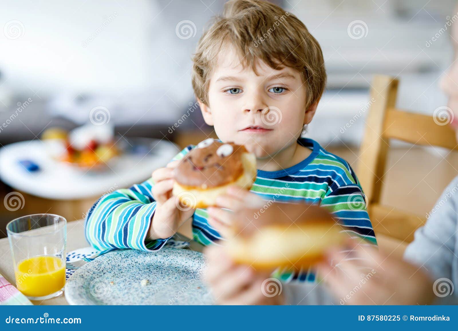 Adorable Little Preschool Boy Eating Donut Indoor Stock Image - Image ...