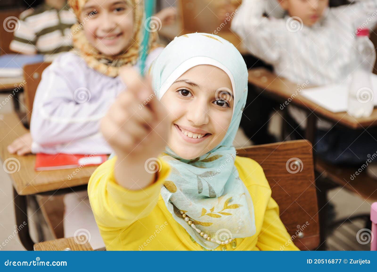 adorable muslim girl in classroom