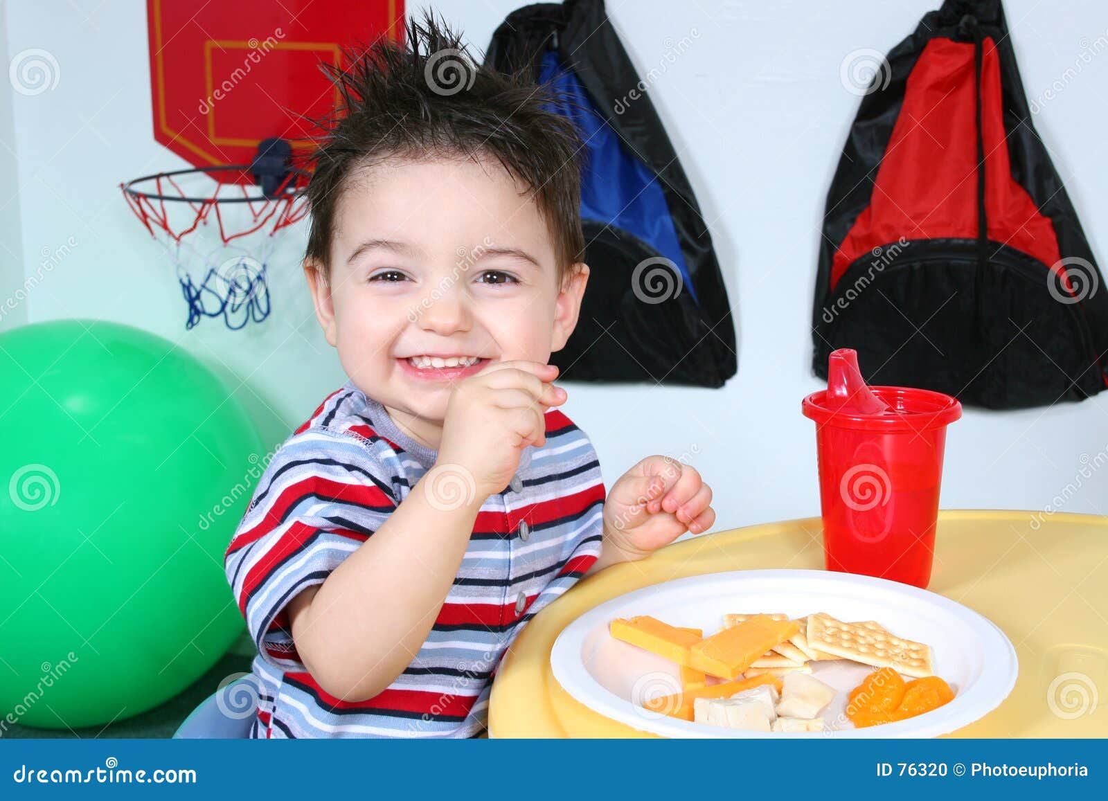 Adorable Preschooler Eating Snacks Stock Photo Image of orange, teeth