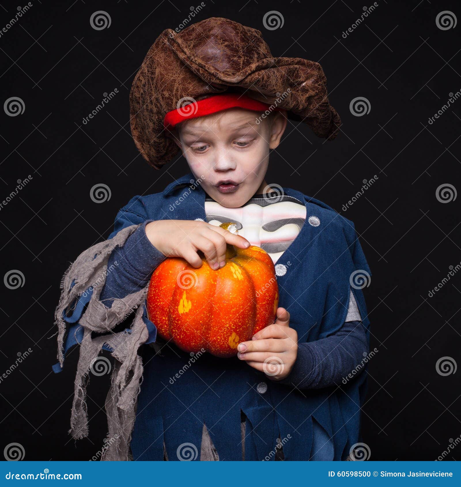 Adorable Young Boy Dressed in a Pirate Outfit, Playing Trick or Treat ...