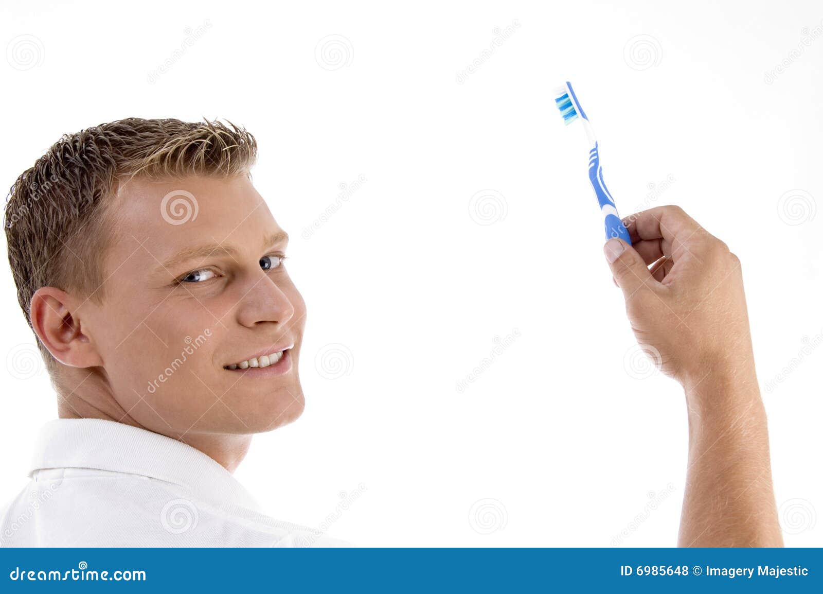 Adult caucasian holding toothbrush. Adult background camera caucasian holding posing to toothbrush white