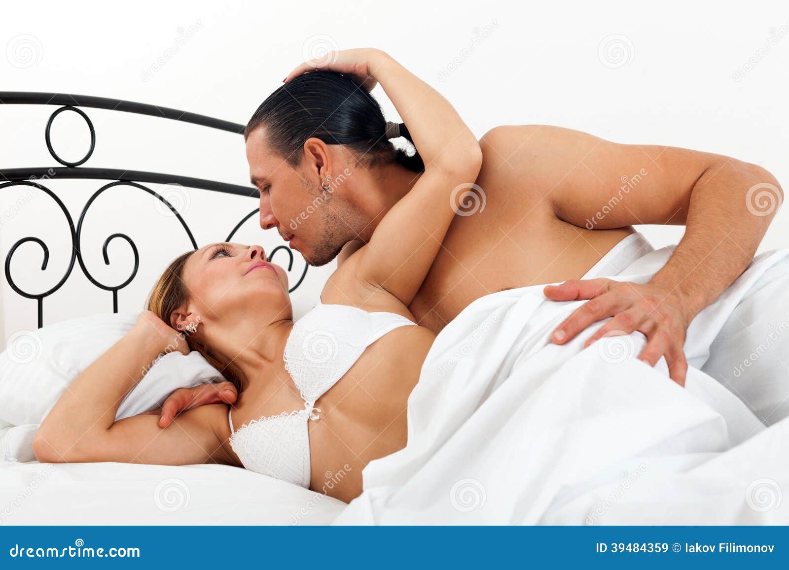 Adult Couple Having Sex on Bed Stock Image