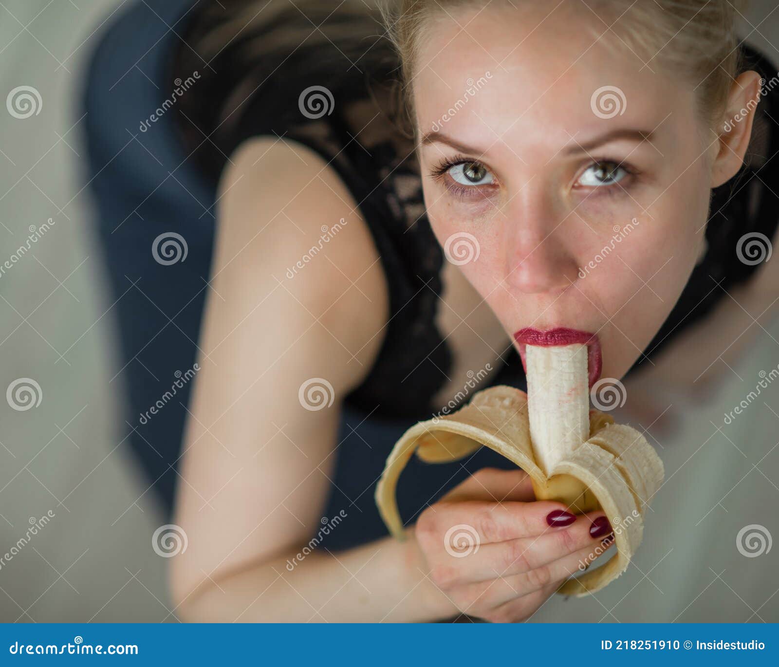 Adult European Girl Sexually Licks and Sucks a Big Banana. Fantasies about Oral pic